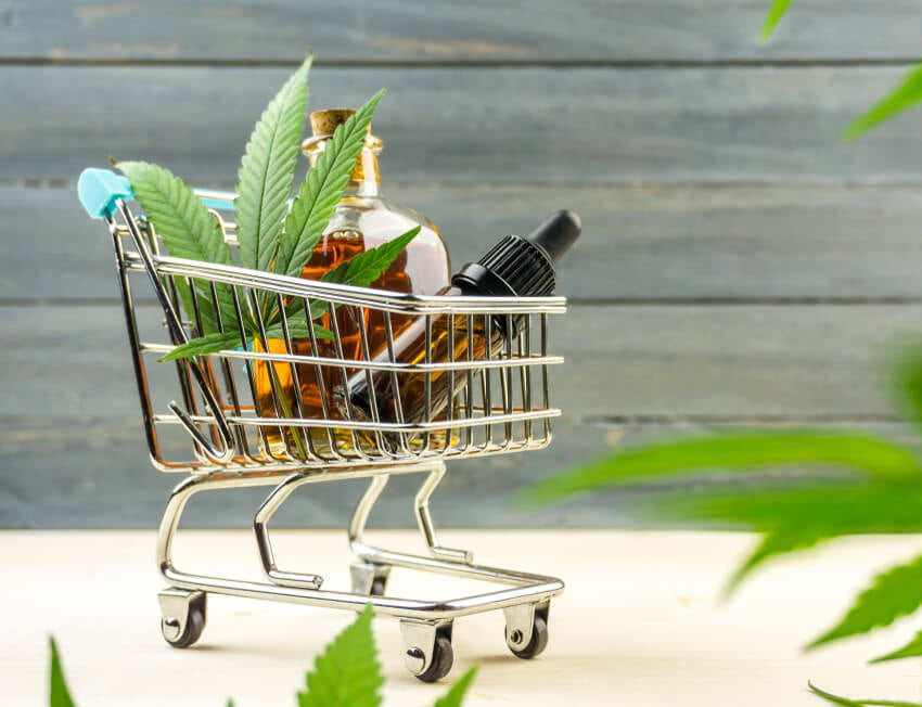 mini carrinho de compras com CBD dentro